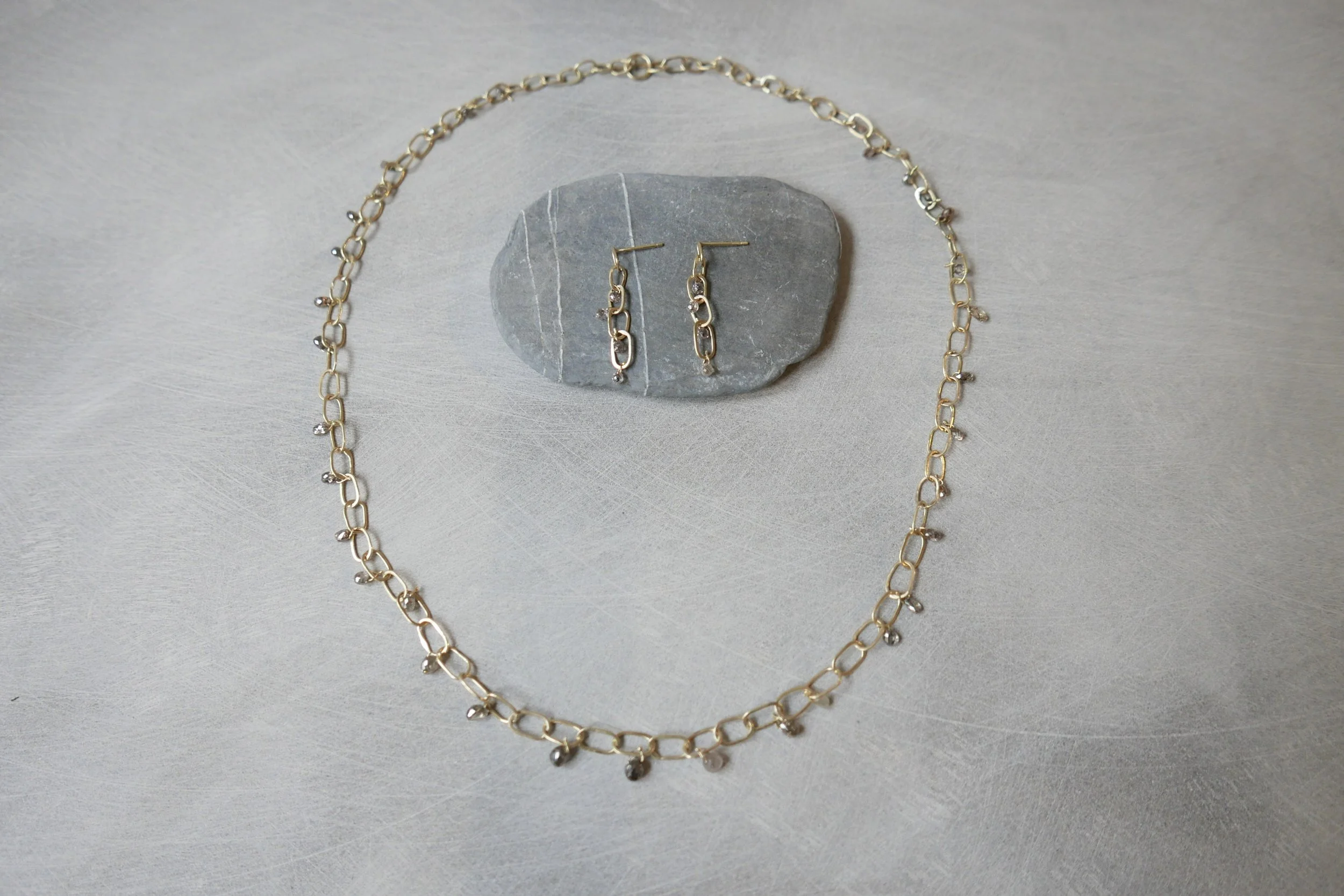 18 carat gold and diamond bead set