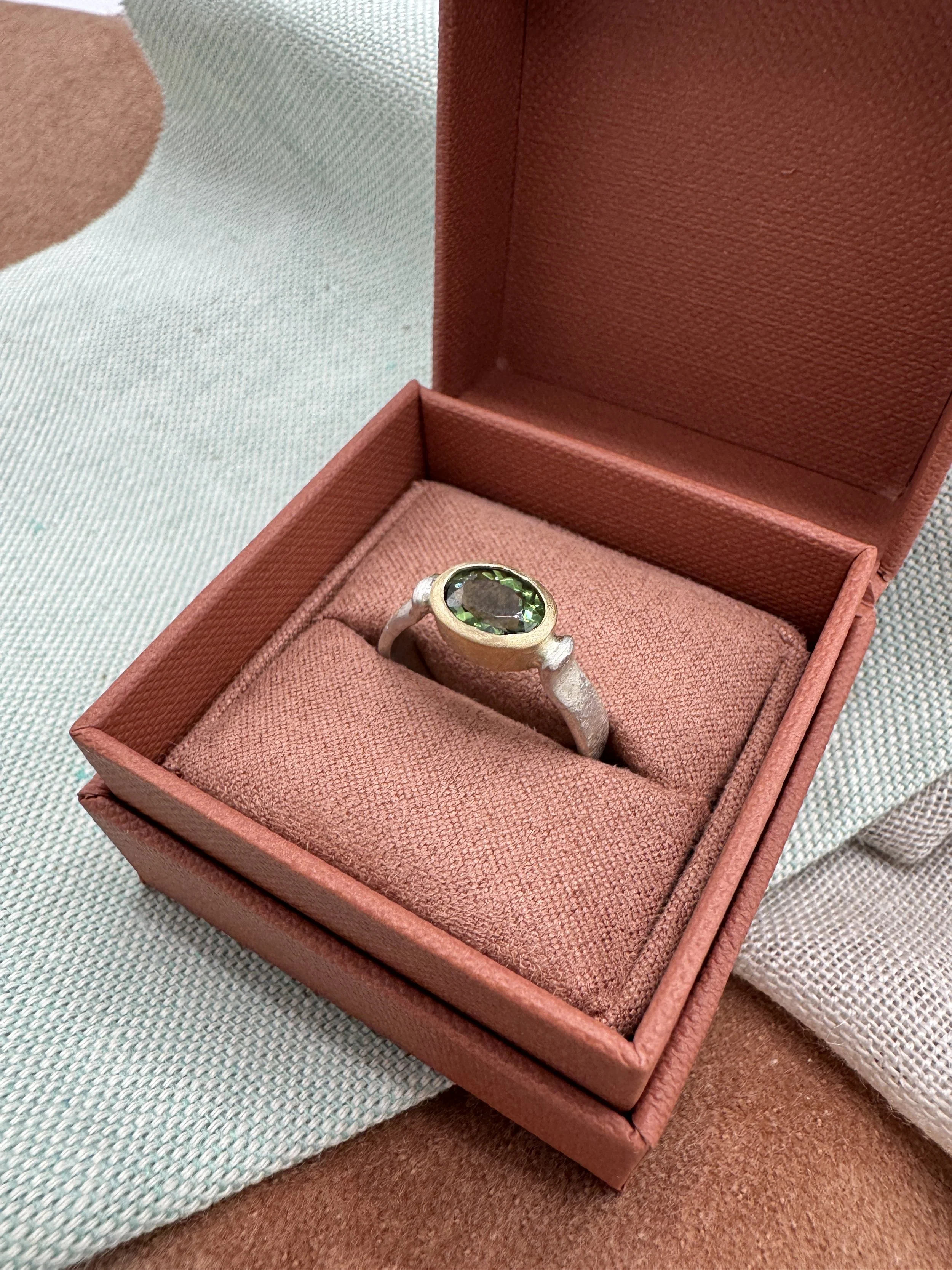 Tourmaline, gold and silver ring