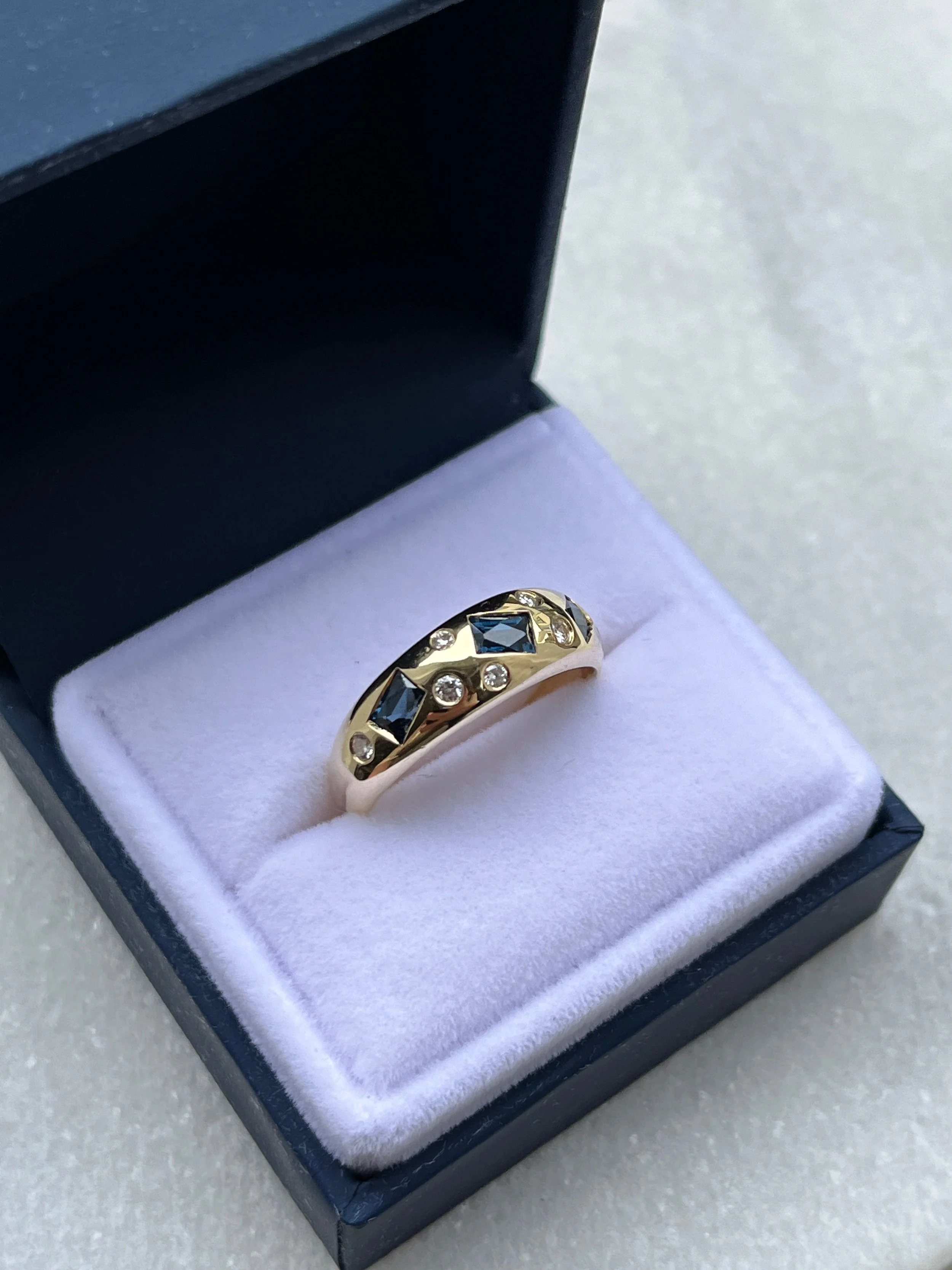 Sapphire and diamond bombe ring