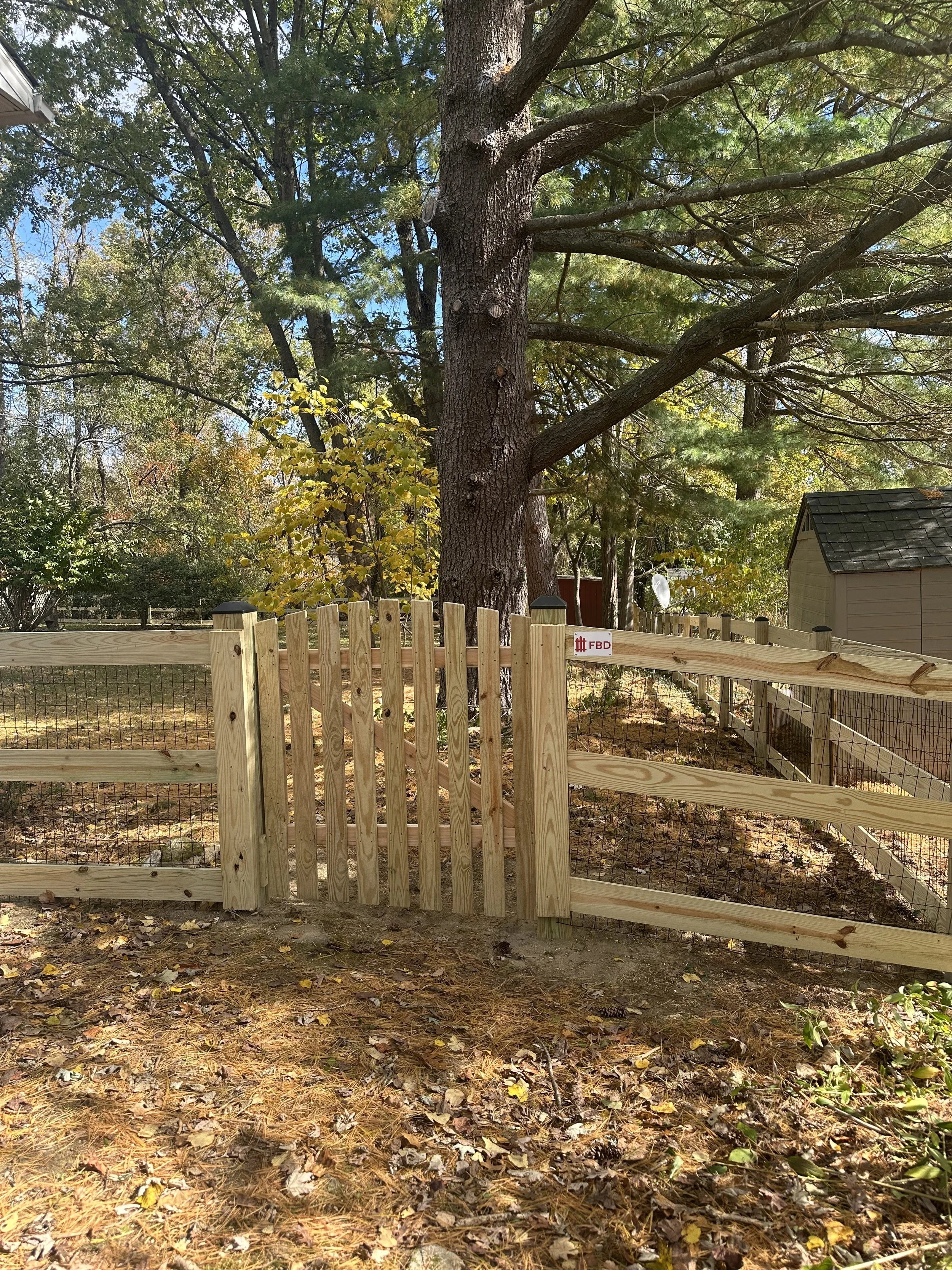 3-board paddock fence in Ellicott City with wire