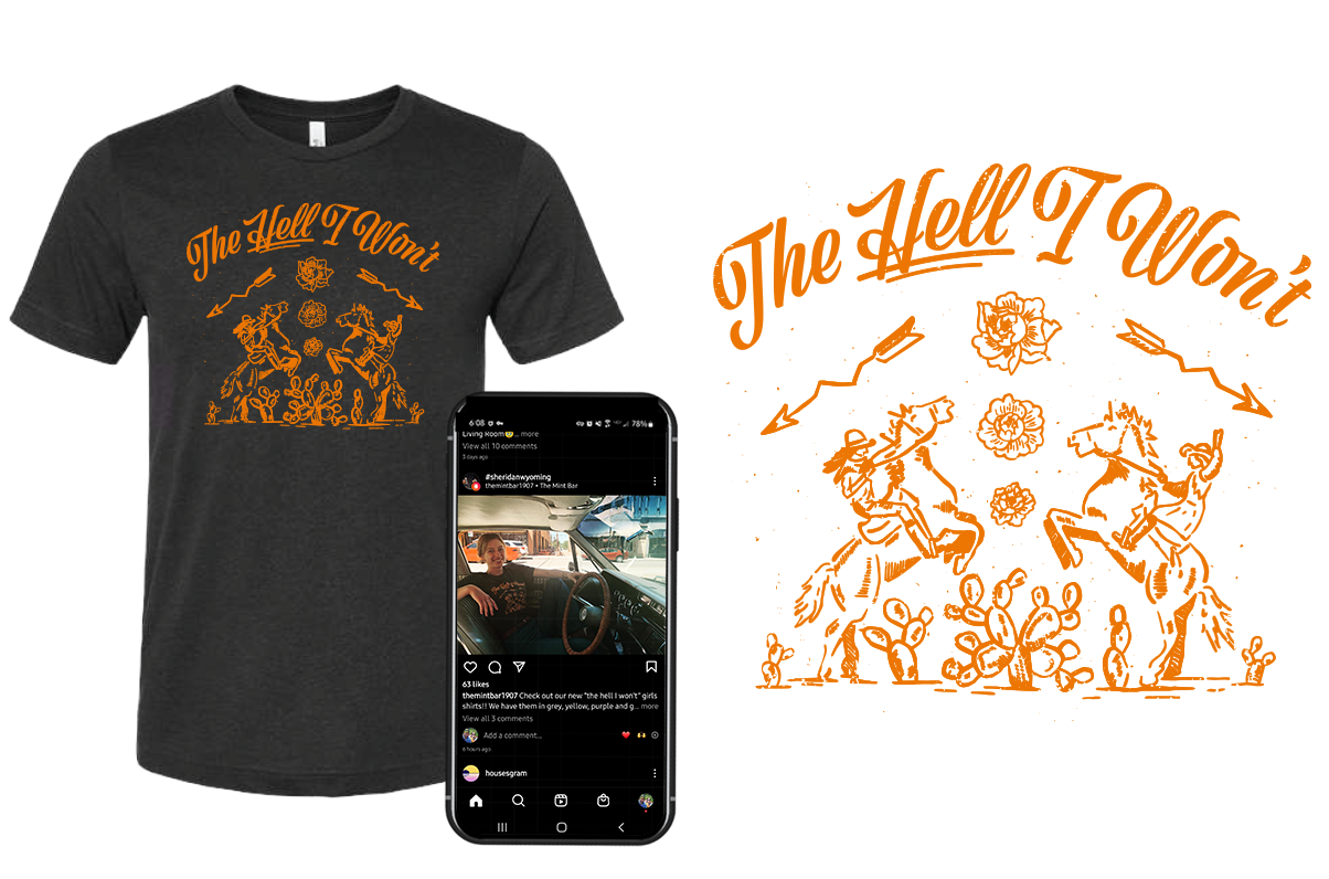 A black T-shirt with an orange graphic design and text that says "The Hell I Won't," featuring a drawing of two horses and cowboys, along with some flowers and cacti.