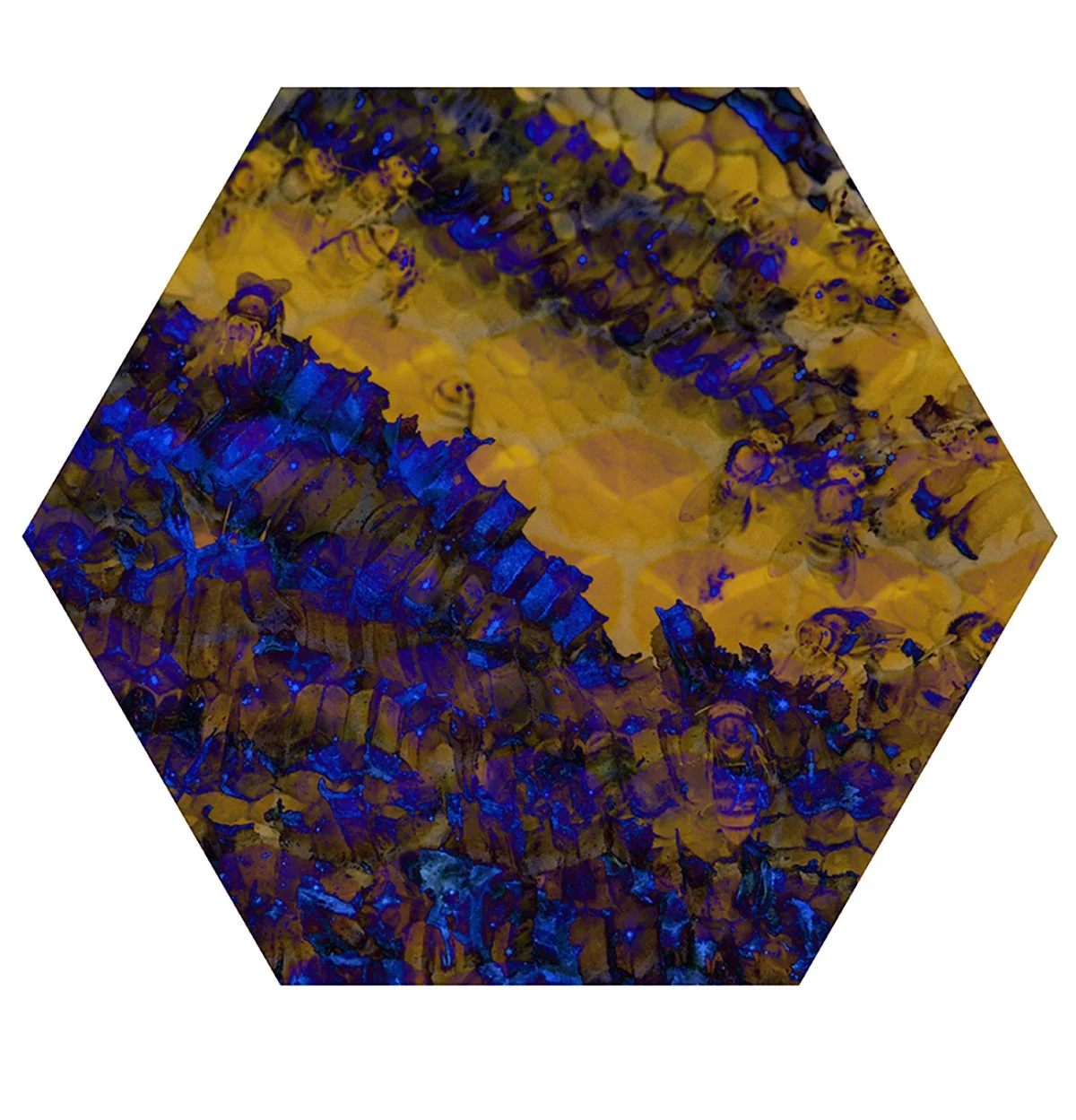 A hexagonal glass sculpture with swirling blue and yellow abstract patterns.
