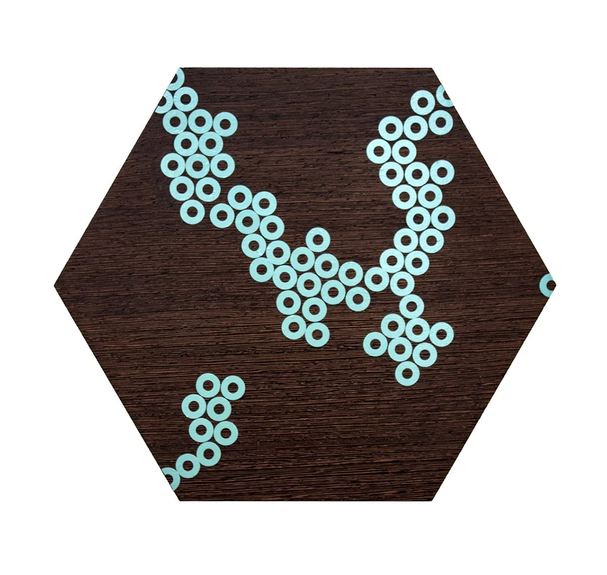 Bead arrangement on a hexagonal wooden surface forming the letter 'V'