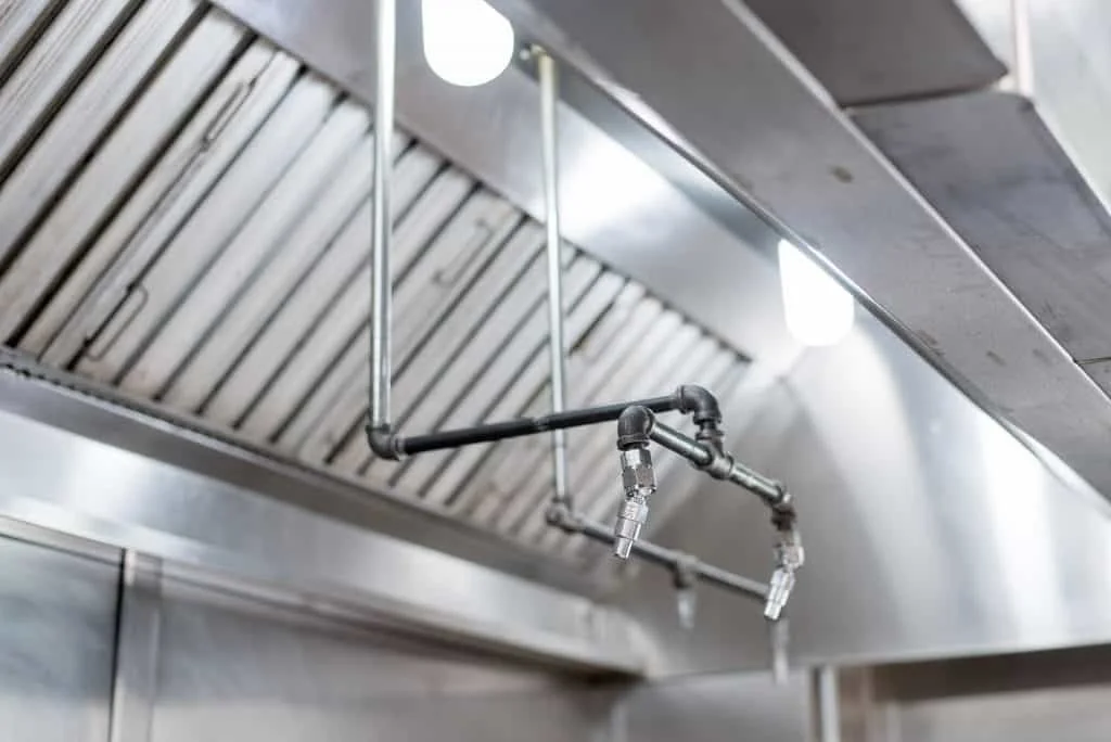 Industrial kitchen exhaust hood with ansul systems needing inspection and testing