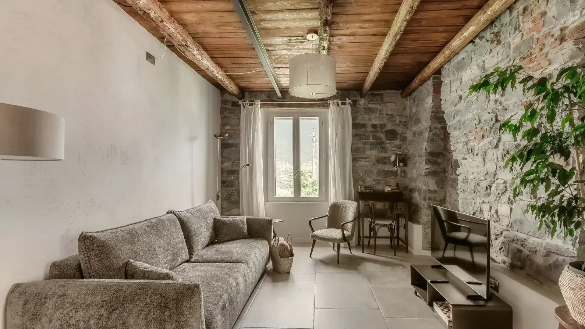 Rustic living room with stone walls