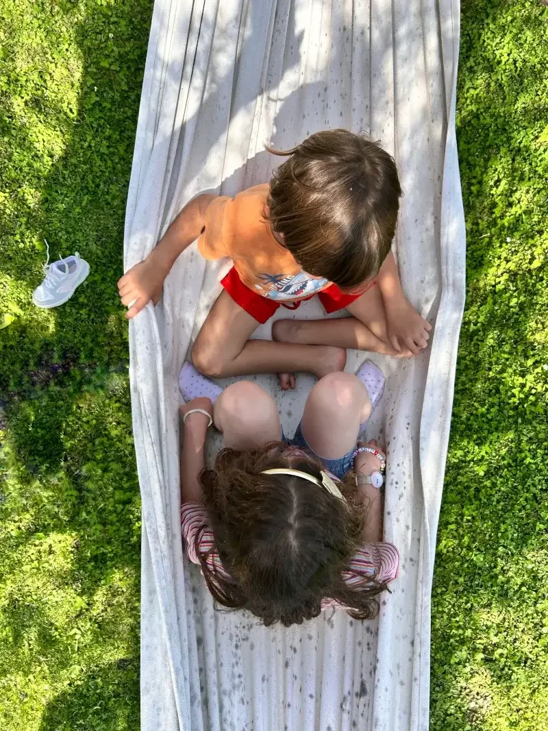 Kids playing on hammock