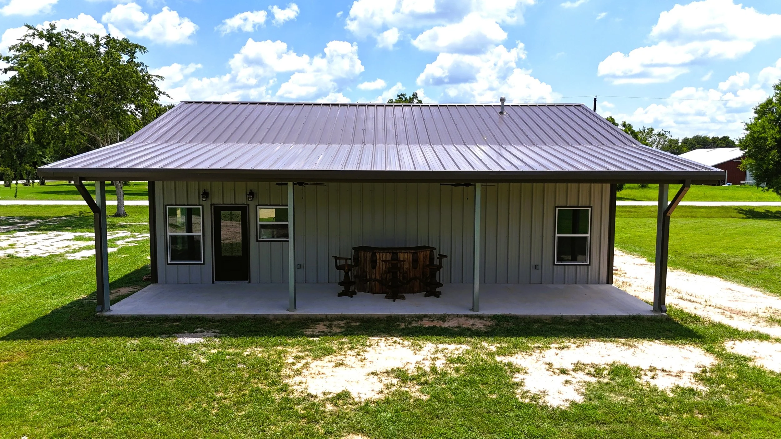 Back porch of bolt up metal barndominium in Wharton County, TX.