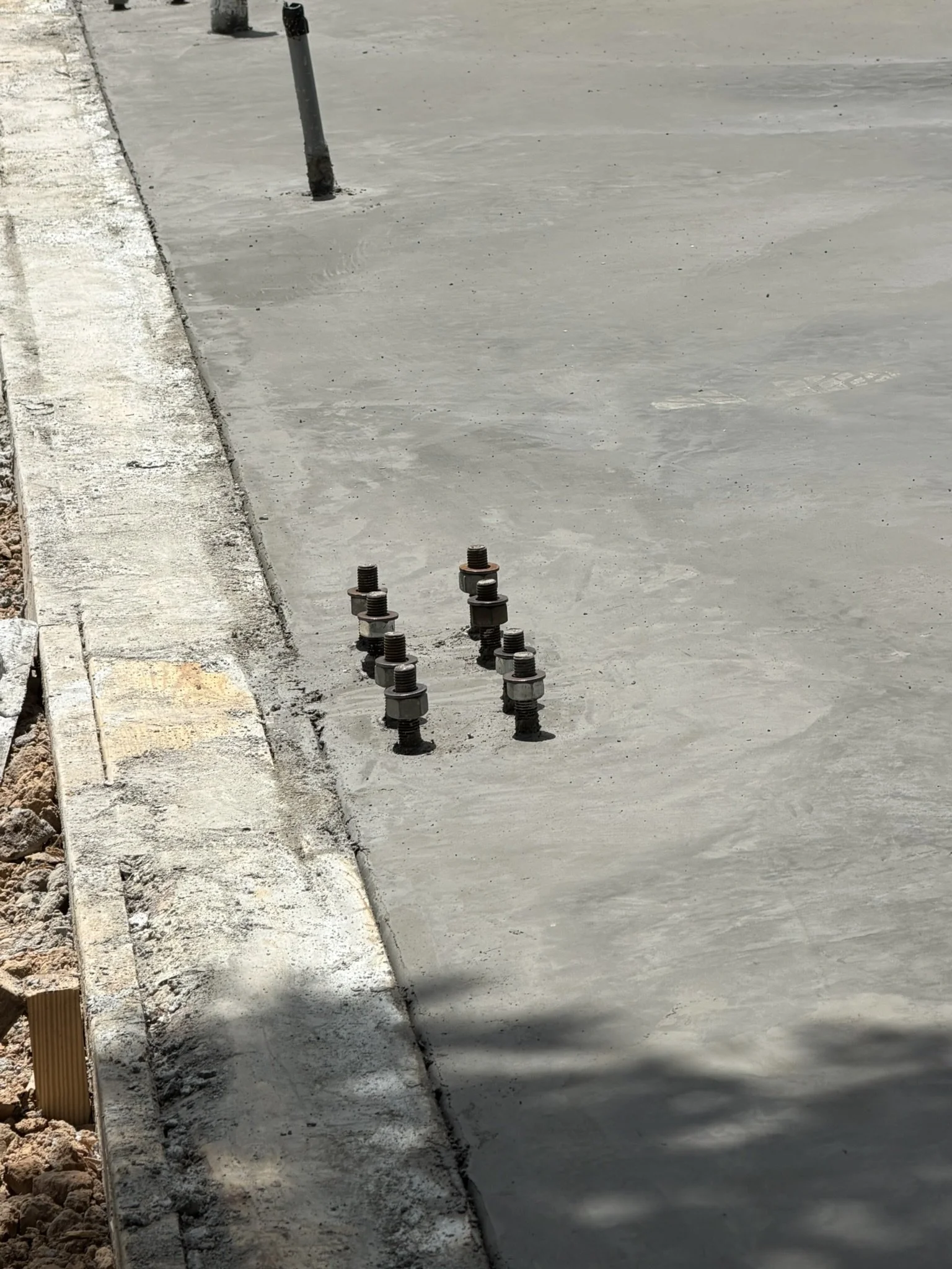 Anchor.bolts.after.concrete.pour.damon.tx.JPEG