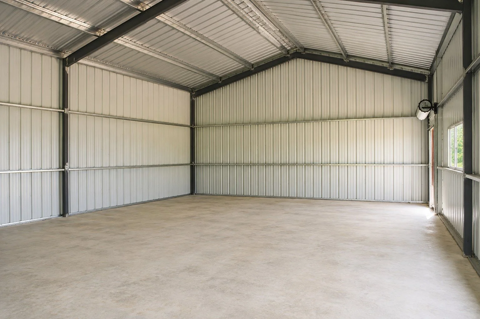 Heavy-duty steel framing and galvanized purlins provide long-term strength and durability throughout the building.