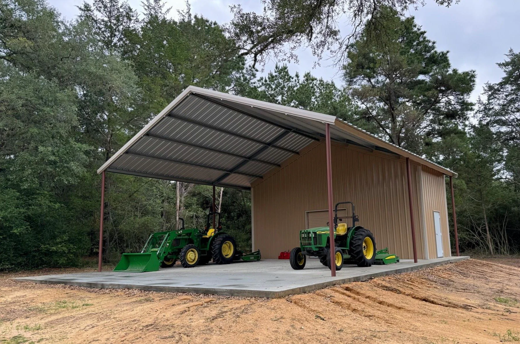 Small utility garage with large front awning in Cat Spring Texas