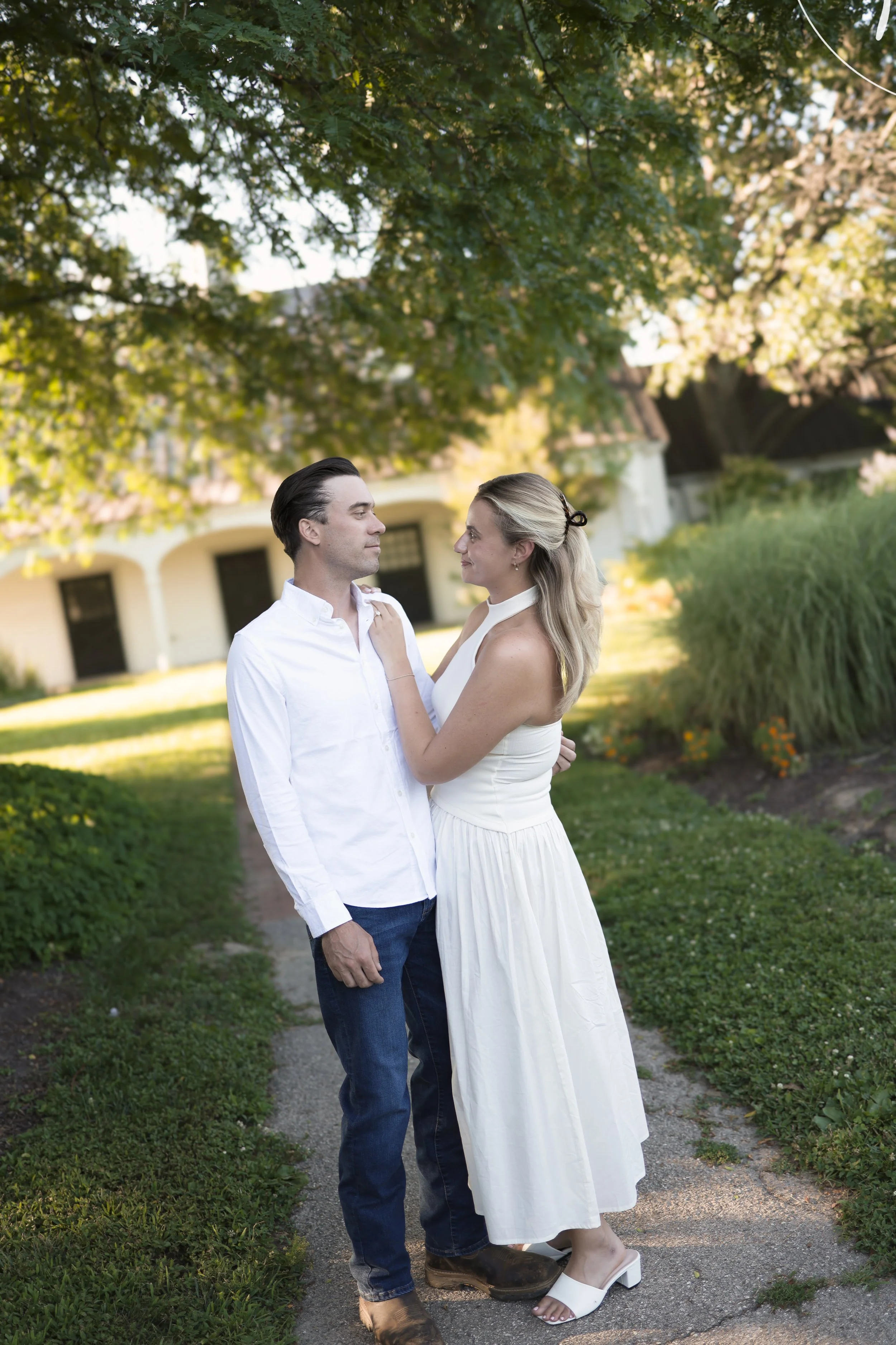 St Louis engagement photographer capturing candid couple at sunset