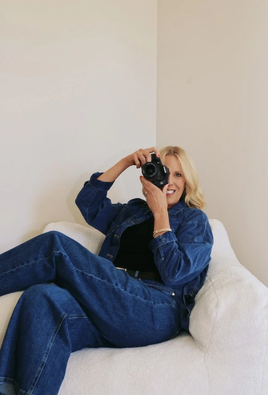 Amy Farroll holding a camera