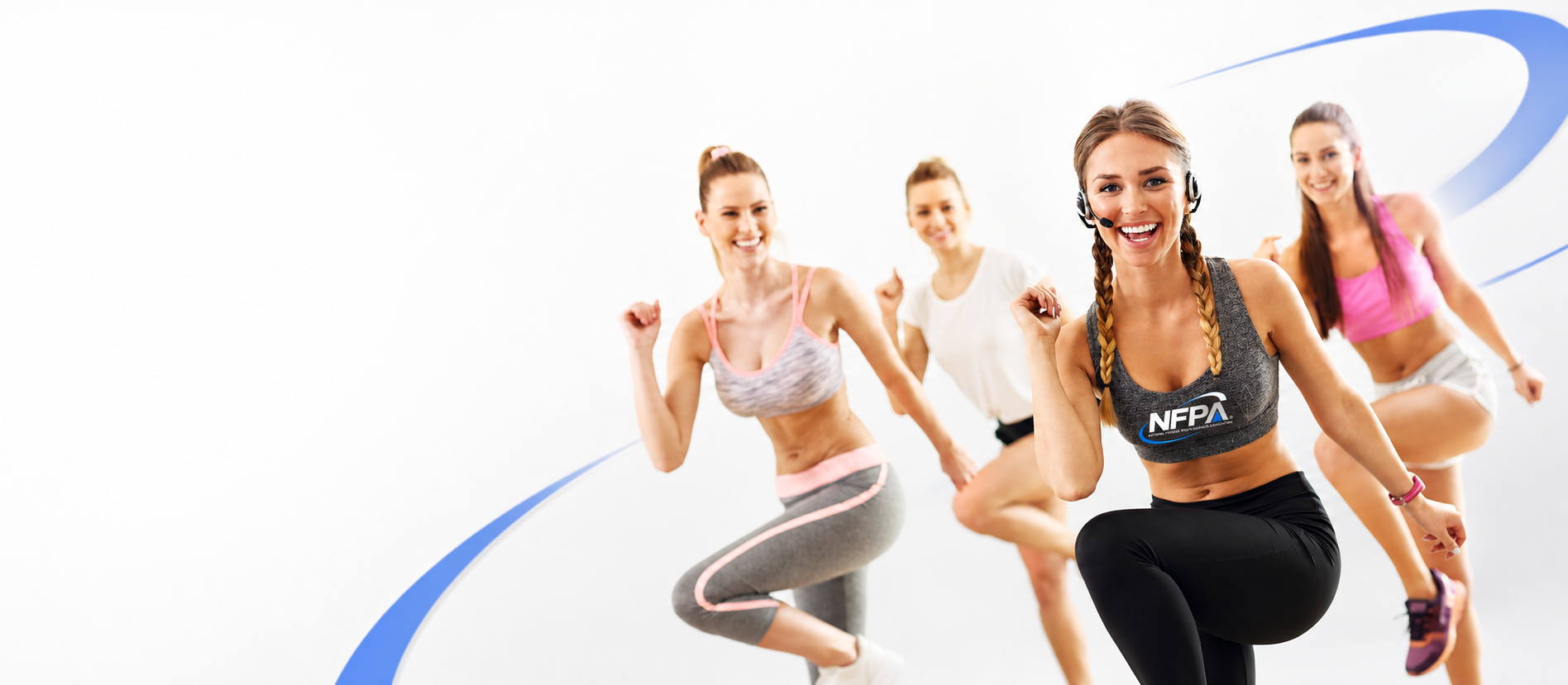 NFPA group fitness instructor leading an energetic group fitness class