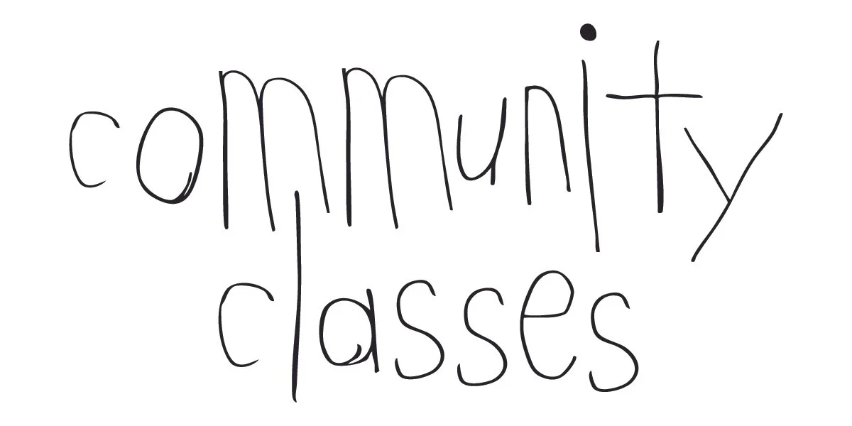 Handwritten text reading "community classes" on a white background.