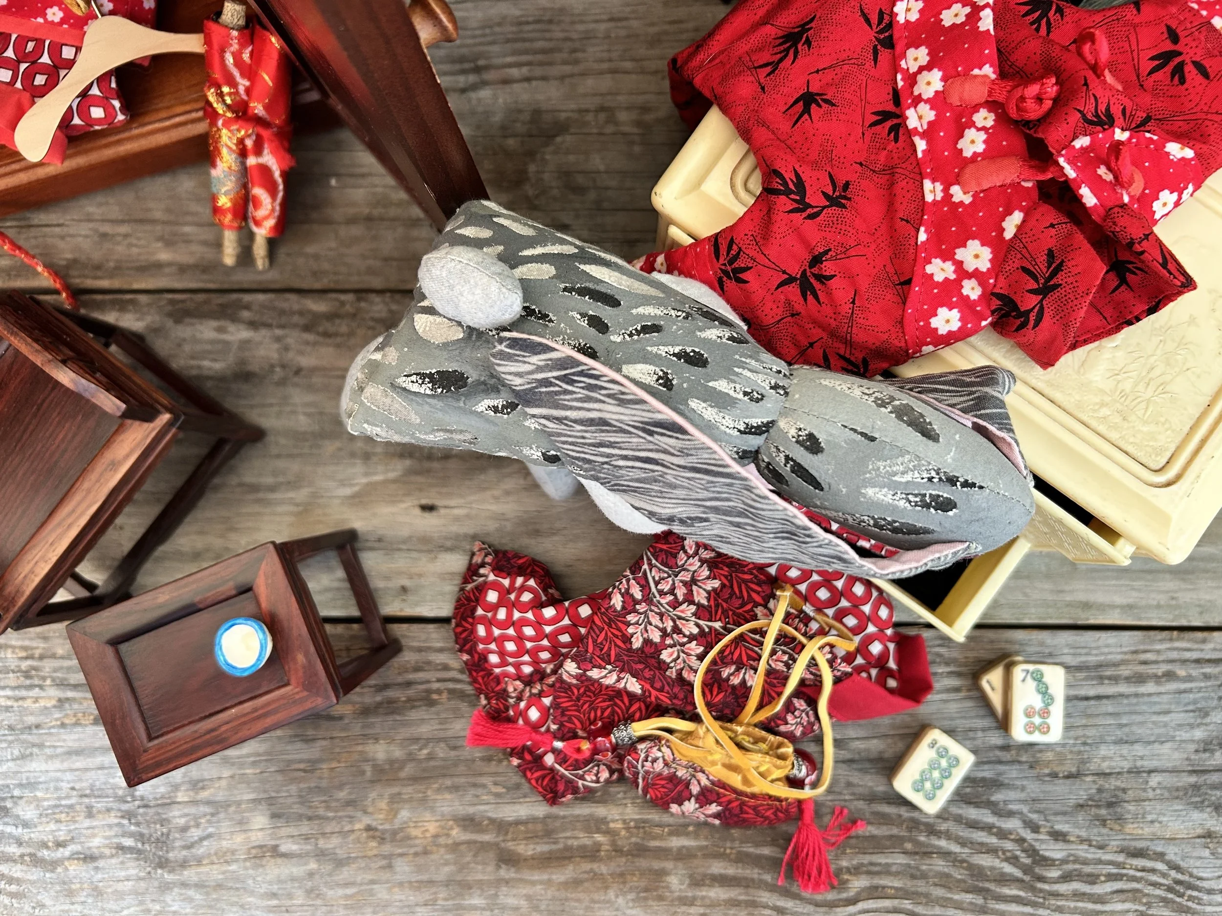 Chinese New Year Bunny chooses a pair of kùzi from her bottom dresser drawer.