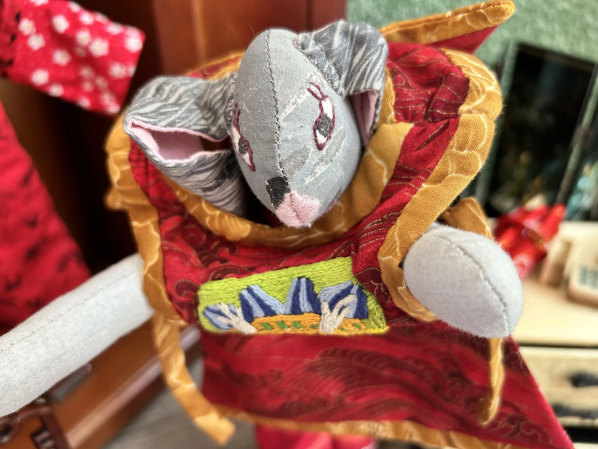 Chinese New Year Bunny tries on her sleeveless vest.