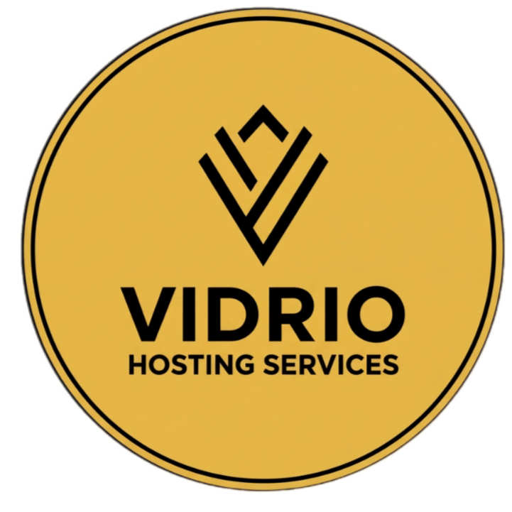 A circular logo for Vidrio Hosting Services featuring a black geometric design above the company name in bold black letters on a gold background.