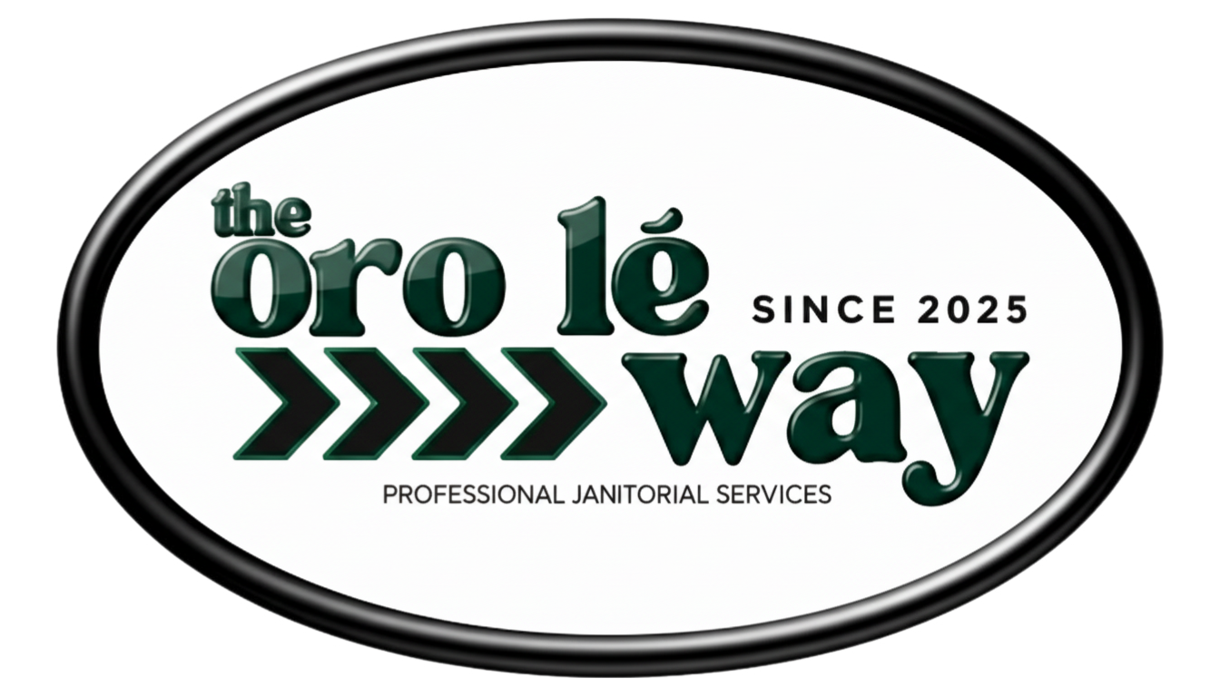 Oval logo for the company 'The Ore Lé Way' with green and black text, featuring arrows pointing right, and the tagline 'Professional Janitorial Services'.