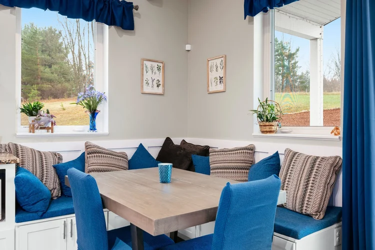 Dining nook with built in corner bench seating