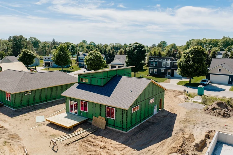 Aerial of the rear and side of the home