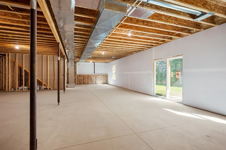Unfinished walkout lower level with sliding door