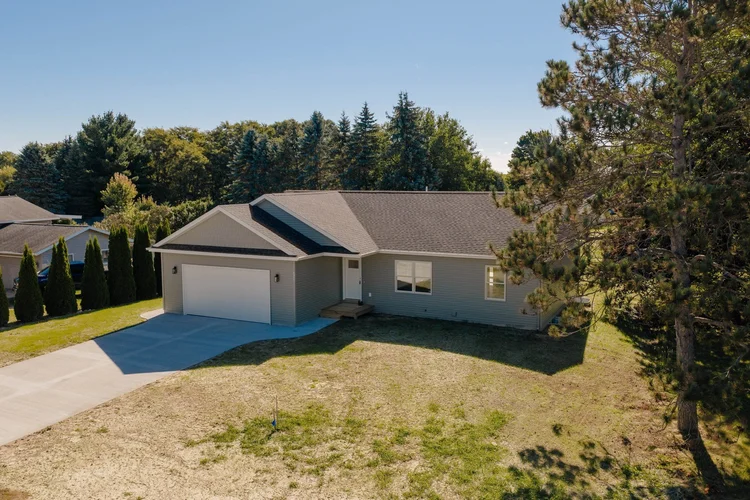 Elevated front view of the house and yard