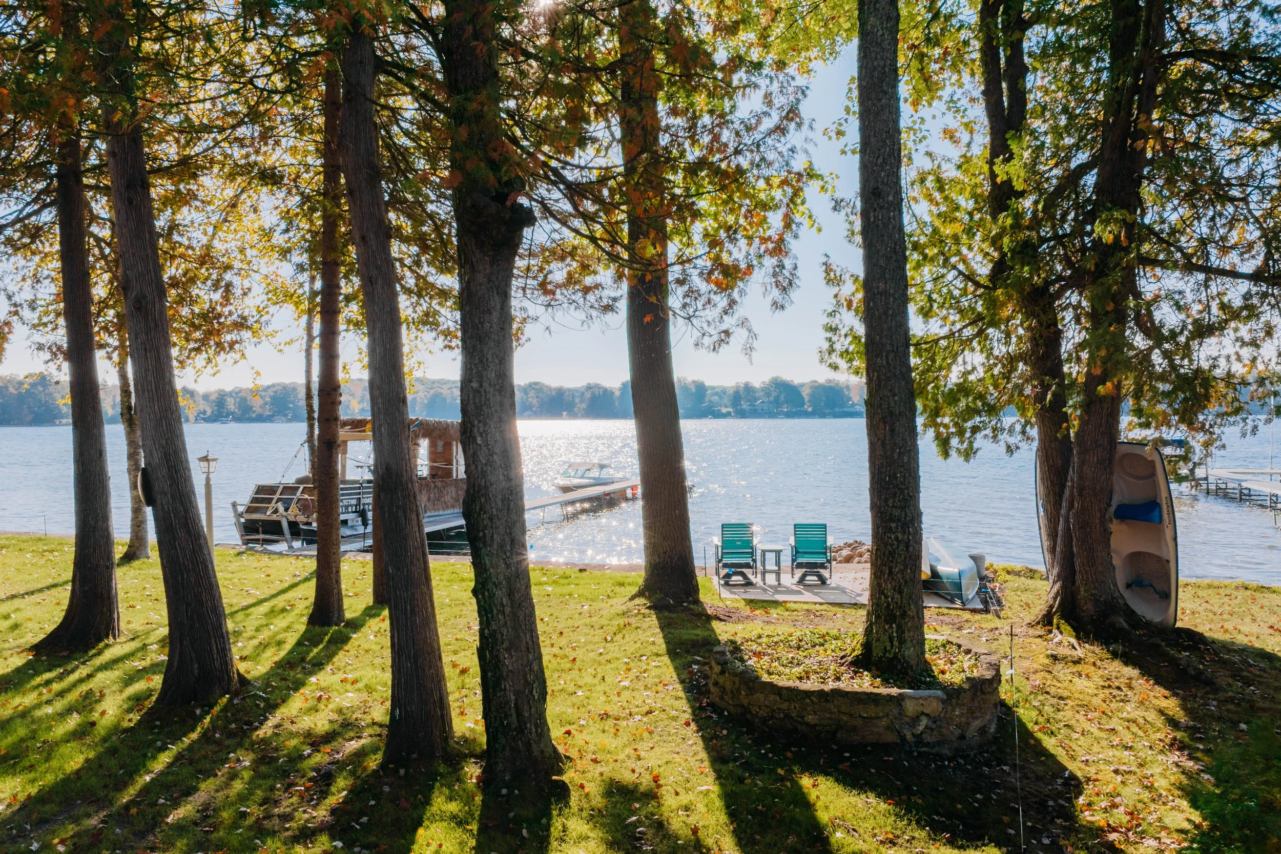 northern michigan lake in the summer pontoon nostalgic real estate