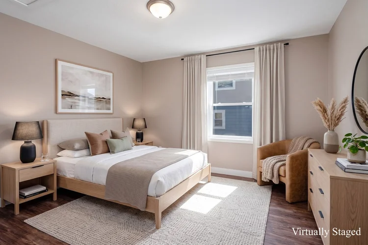 Main floor primary bedroom, virtually staged