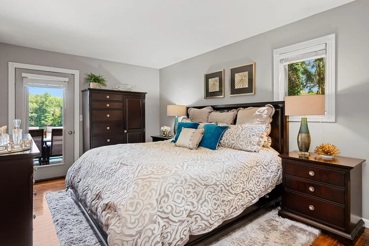 Bedroom with a door to the deck
