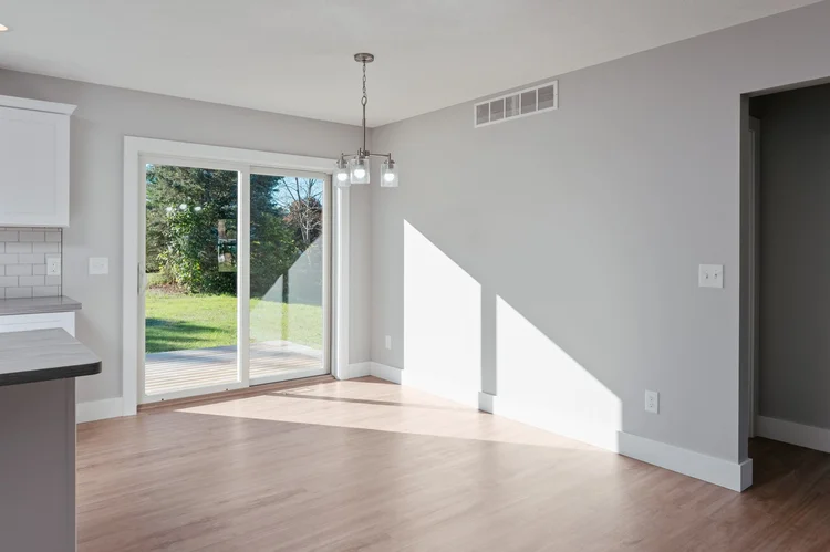 Dining area with chandelier and sliding door
