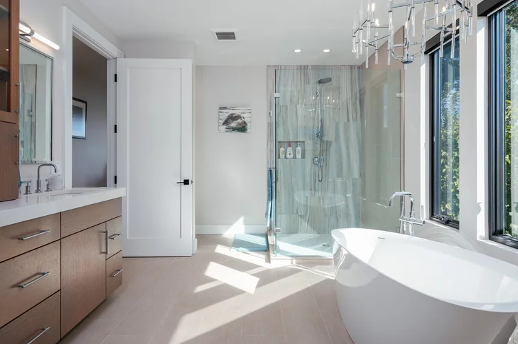 Bathroom with freestanding tub and glass shower