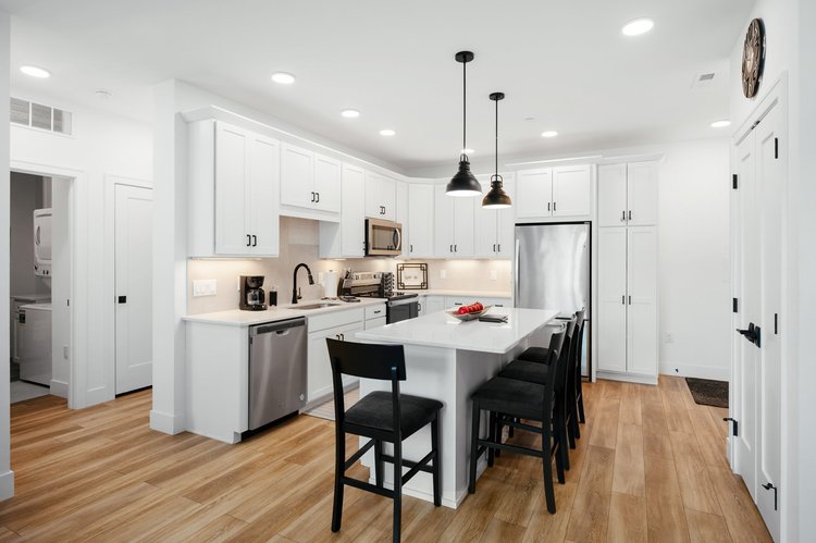 Kitchen with island and pendant lights