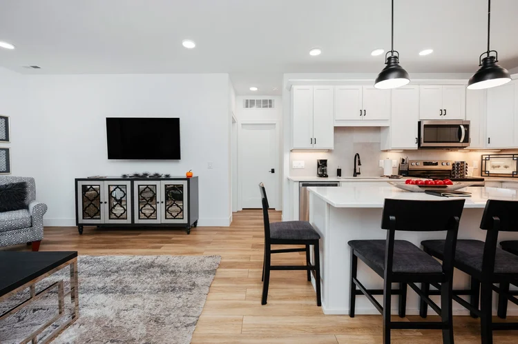 Kitchen and living area with island seating