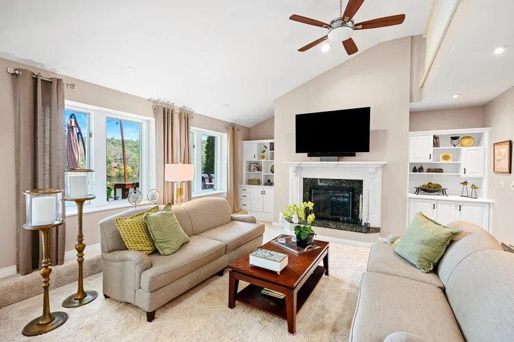 Living room with fireplace and built-ins