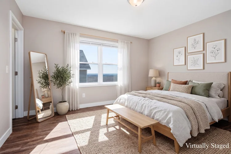 Upstairs bedroom with double window, virtually staged