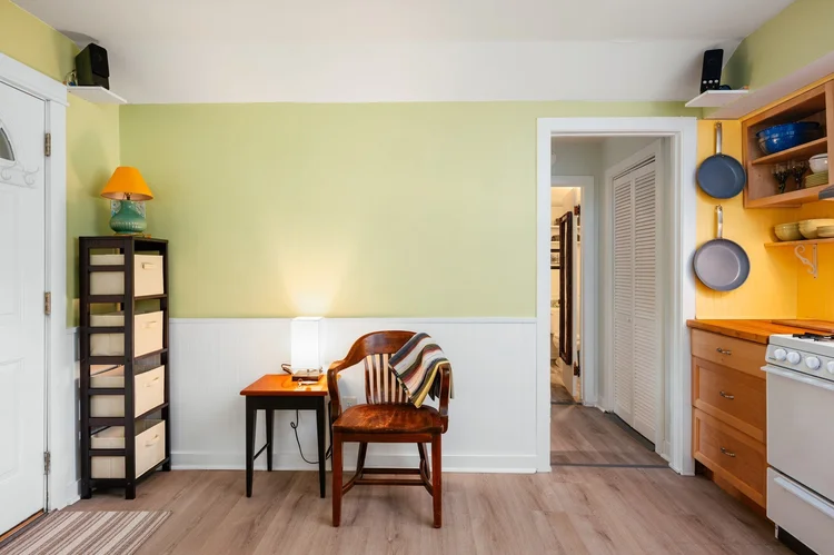 Small table and chair beside the kitchen