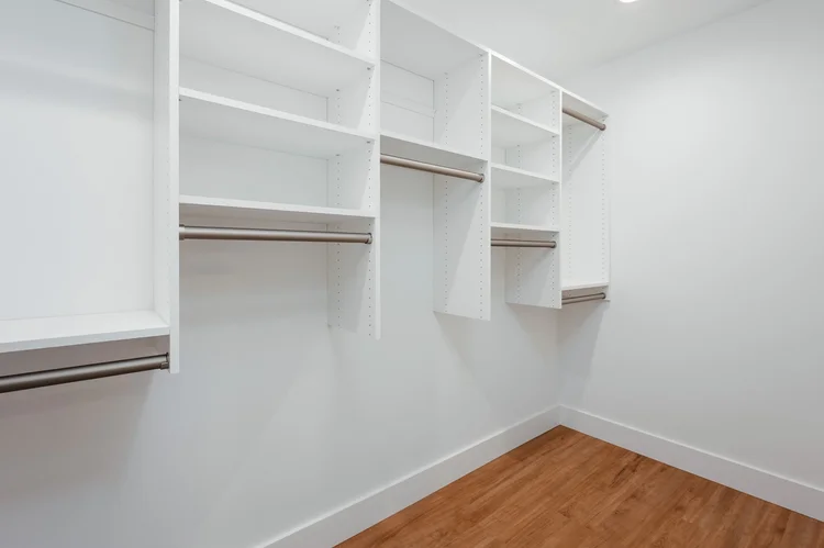 Walk in closet with built in shelving