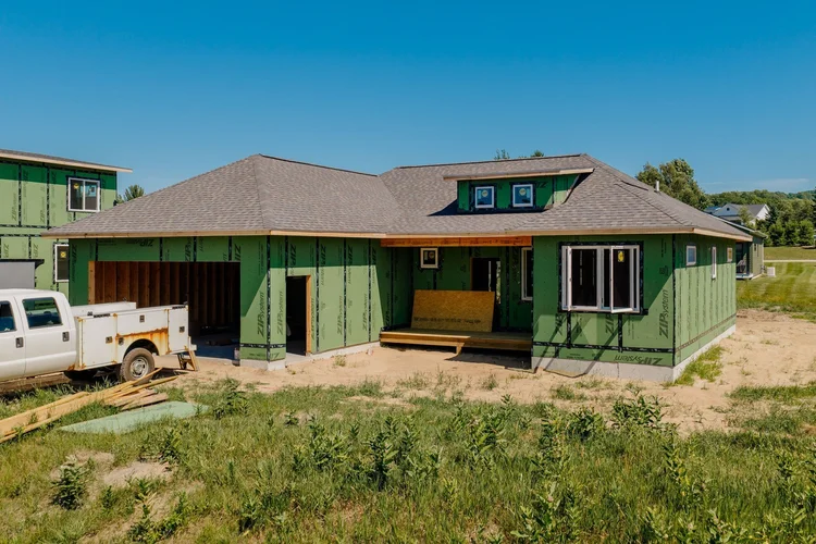 Front of the home with garage and covered porch
