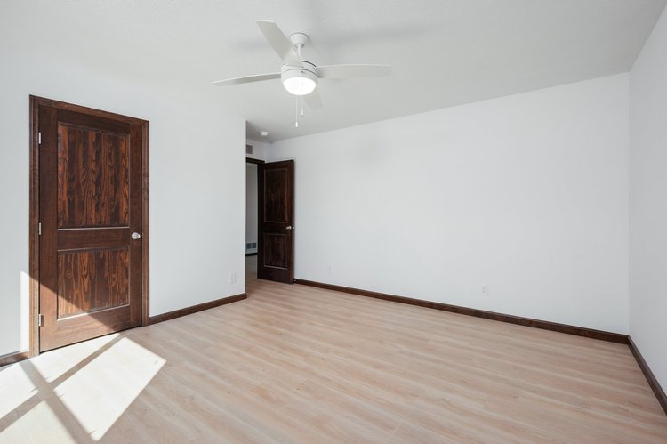 Bedroom with wood doors