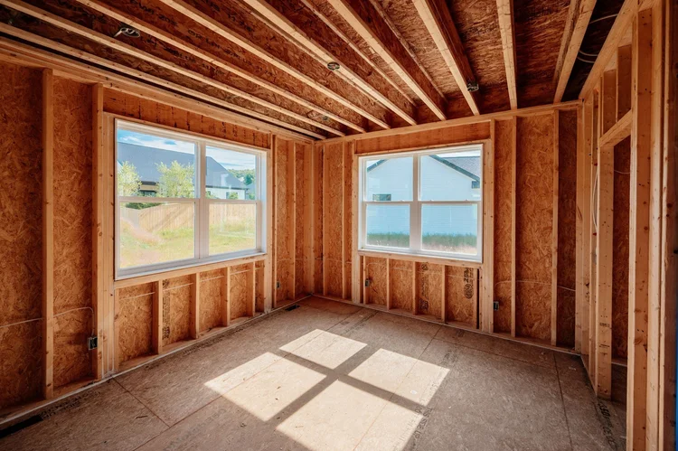 Framed bedroom with two windows