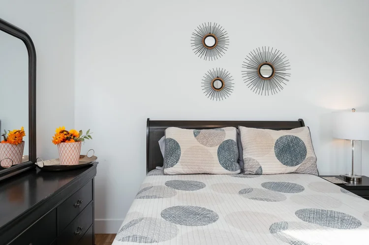 Bedroom with bed and dresser