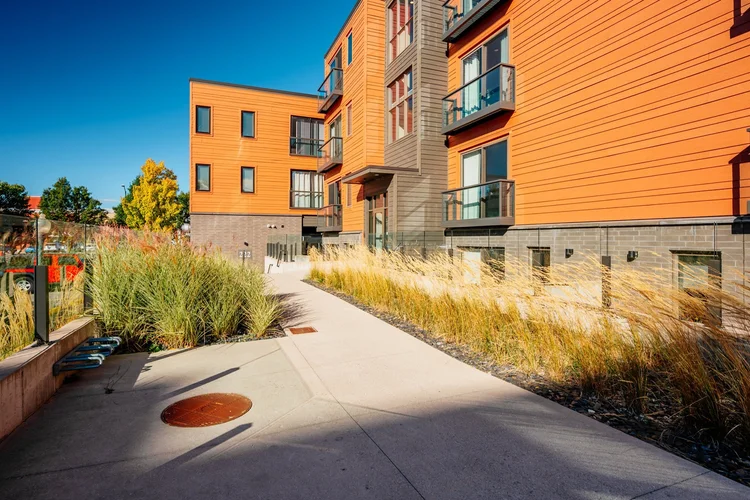 Walkway and landscaping beside the building