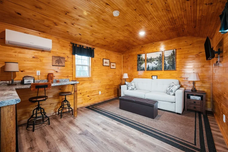 Guest house interior with knotty pine walls