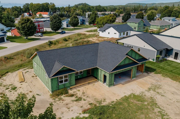 Aerial view of the home and neighboring houses