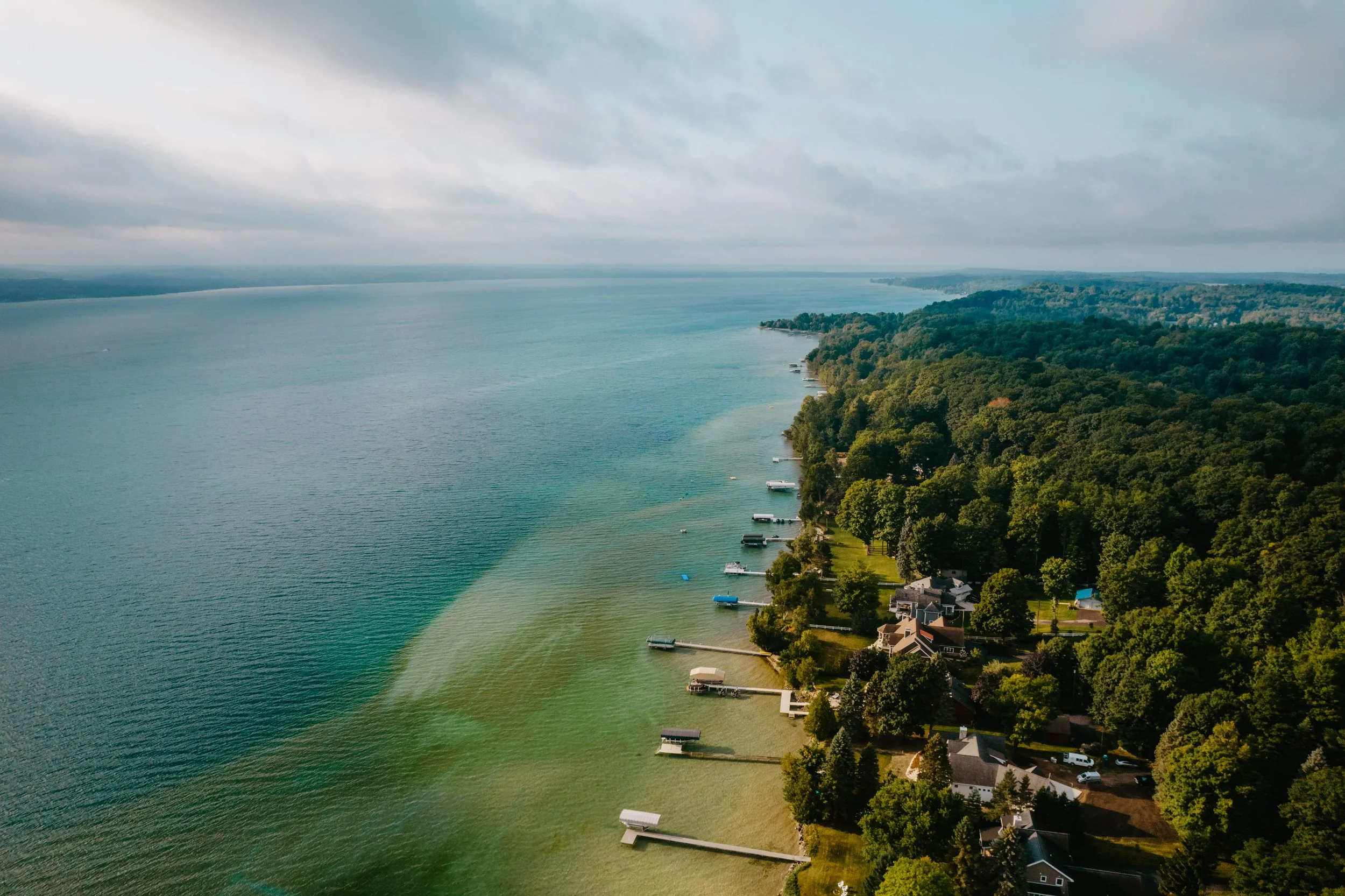 torch lake aerial photo landscape real estate docks summer michigan up north