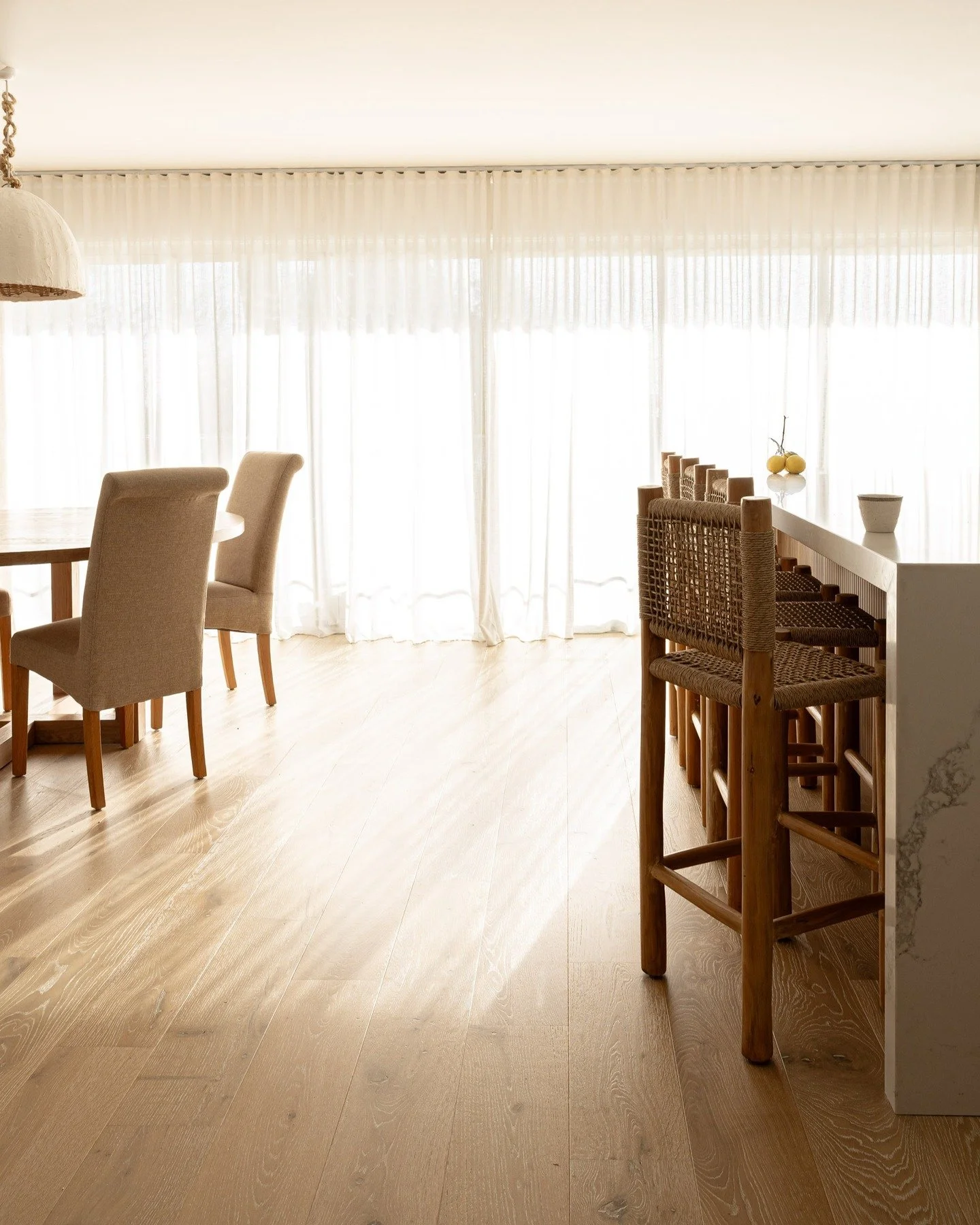Nelson Bay residence bathed in sunlight, perfectly preserved so it can be felt again and again through the art of still photography. Light, texture and materiality in perfect conversation in this space.
