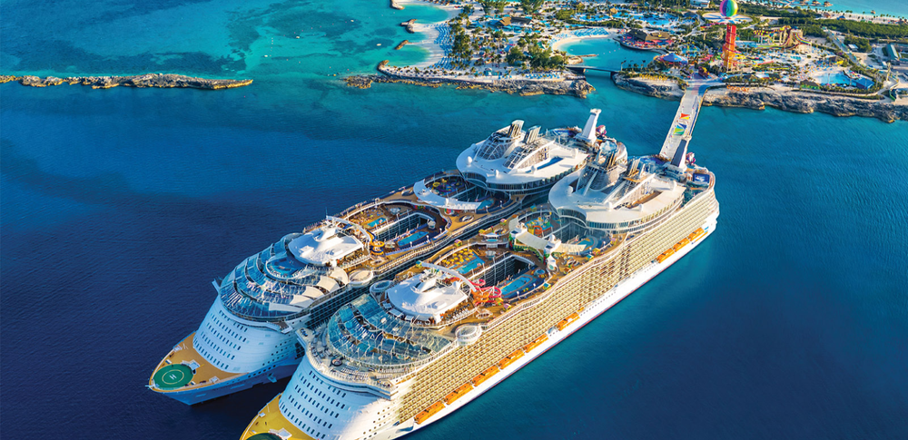 Cruise ships beside the turquoise waters of CocoCay