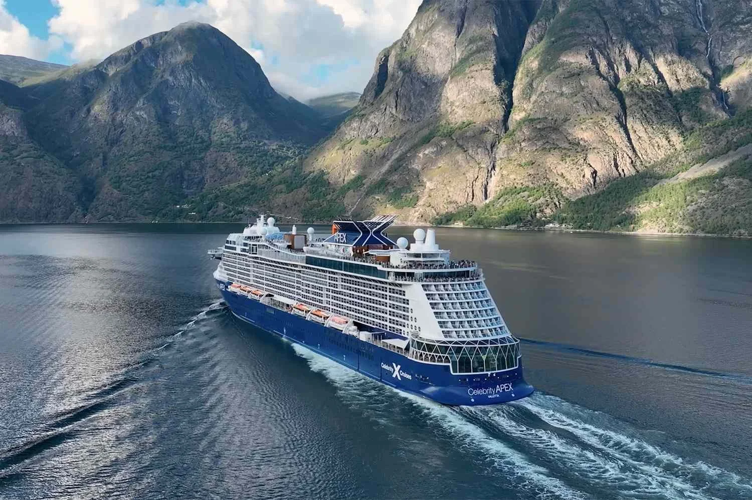 Celebrity Apex surrounded by Norwegian fjord scenery
