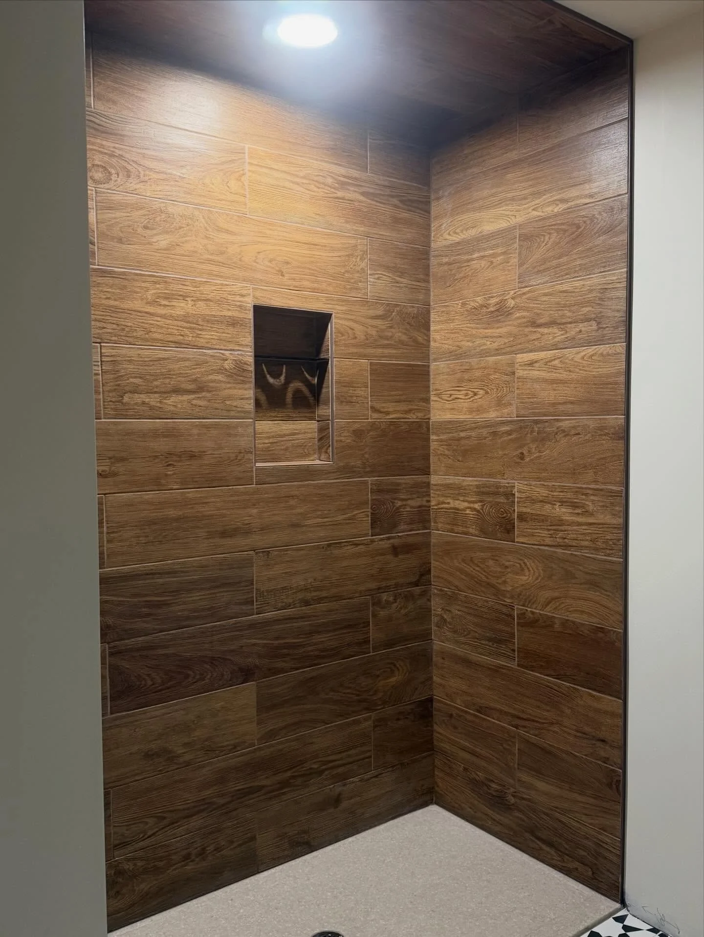 Setting tile is one of our favorite jobs!  If you are interested in a beautiful new shower, floor, or backsplash, contact us to discuss your options!