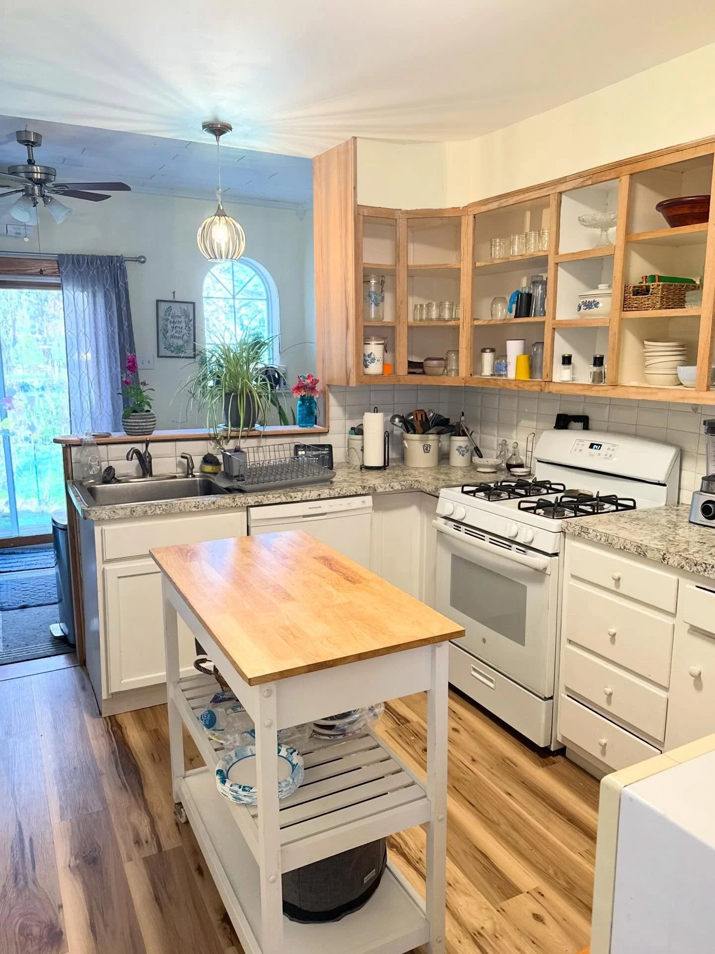 This customer had water damage from a burst pipe in their kitchen ceiling. 

We were able to repair the ceiling and install new LVP flooring just in time for them to still enjoy Easter dinner with their family!